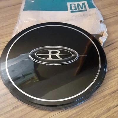 Новый GM 76-77 Buick Riviera колеса ступицы колпачок центр эмблема медальон 1245006 E32 - Изображение 1 из 3