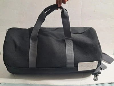 Bolso de Mano Calvin Klein Fragancias Imitación Lona, Negro para Viajes, Gimnasio, Fin de Semana Foto 1 de 4