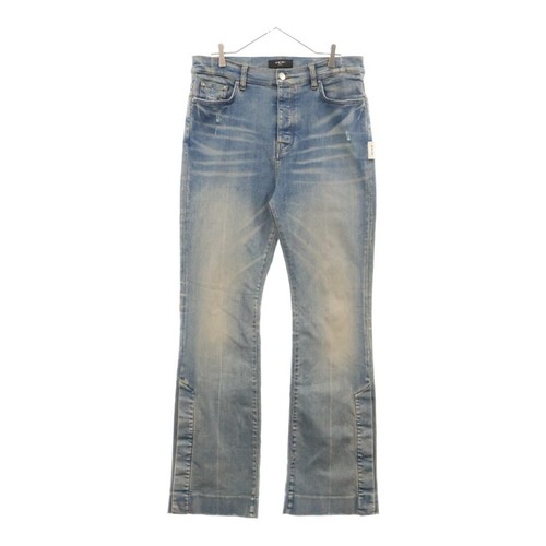 AMIRI Pantalone denim svasato con bottoni laterali colore indaco