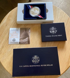 1994 U.S. Capital Bicentennial Uncirculated Silver Dollar in US Mint packaging - Picture 1 of 2