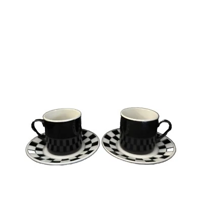 Juego de dos tazas y platillos de café Demitasse negros a cuadros Cafestrada Espresso Foto 1 de 4