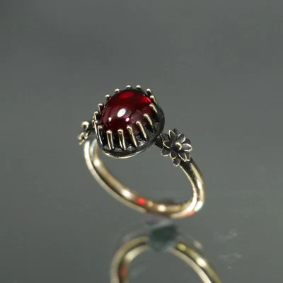 Anillo de piedra granate flor de loto Foto 1 de 4
