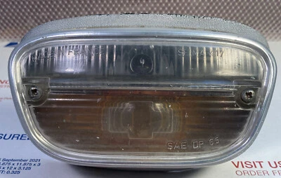 Peugeot 404 1961 delantero transparente/ámbar, luz de giro. Con enchufe.  Lente con chip pequeño Foto 1 de 3