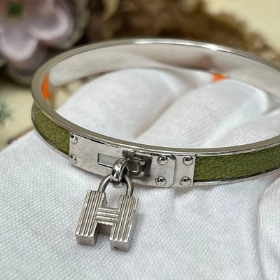 Bracelet Hermes Kelly H Cadenas en cuir argenté excellent état - Photo 1/4