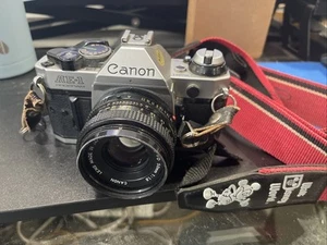 Canon AE-1 Program SLR Camera + 50mm Lens + Disney World Strap - Power-tested - Picture 1 of 15