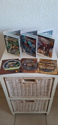 Lot Jeux Uncharted Drake's Fortune 2 Among Thieves 3 l' Illusion de Drake PS3 - Imagen 1 de 4