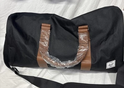 New NWT Herschel Ravine Duffle Bag Black Tan Weekender - image 1 of 4
