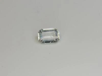 .71CT COLORLESS VERY RARE FACETED STRONG LWUV LIME GREEN HYALITE MEXICAN OPAL - Image 1 of 4