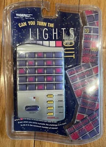 VINTAGE BRAND NEW 1995 LIGHTS OUT GAME TIGER ELECTRONICS MODEL 7-574 SEALED RARE - Picture 1 of 3