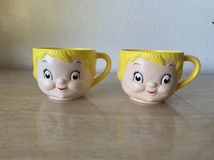 2 Vintage 1970er Dolly Dingle Campbell Kunststoff Suppentasse Tasse geformtes Gesicht gebraucht - Bild 1 von 6