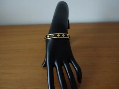 PUNHO LOGOTIPO LEVANTADO ESMALTADO TORY BURCH EM PRETO/OURO TORY. NOVO - Imagem 1 de 4