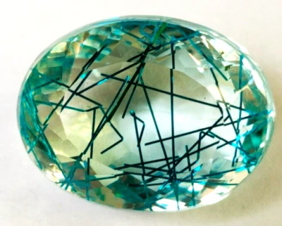 AAA+ Large Rutilated Quartz 69.55 Ct Oval Cut Faceted Lab Created Loose Gemstone - Image 1 of 4