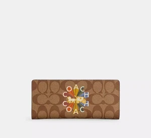 Coach Slim Wallet In Signature Canvas With Coach Radial Rainbow EUC - Picture 1 of 7