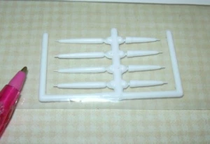 Miniature Chrysnbon Taper Candles on Fret (4 Long, 4 Short): DOLLHOUSE 1:12 - Picture 1 of 1