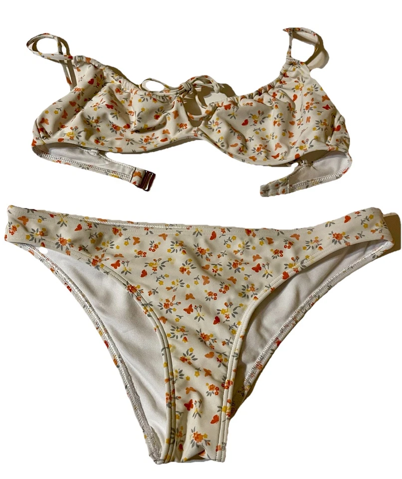 Top de natación de bikini Hollister floral y mariposa con aros XS Top S inferior descarado Foto 1 de 4