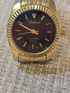 Elgin Galaxie Diamond Goldtone Black Quartz Womans Watch BAD BAND NEW BATTERY - Picture 1 of 12
