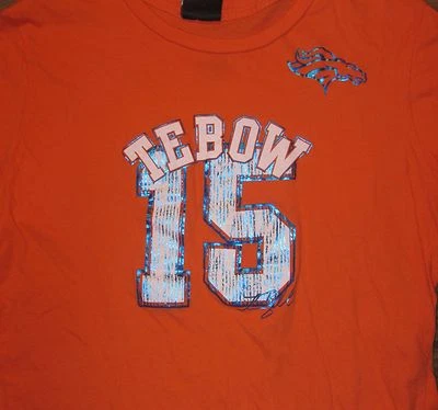 NFL 丹佛野马队 Tim Tebow 女式 T 恤,#15,橙色,M 码,二手状况完好 — 第 1/4 张图片