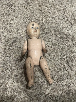 Muñeca bebé antigua de acero prensado con cuerpo de metal de 12" de alto Foto 1 de 4