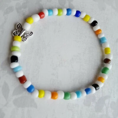 Pulsera con dije de mariposa delgada delgada COLORIDA mezcla aleatoria 4 mm cuentas elásticas Foto 1 de 4