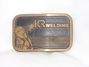 K&R SCHWEISSGURTSCHNALLE, DYNABUCKLE MASSIVMESSING, WERBUNG - Bild 1 von 2