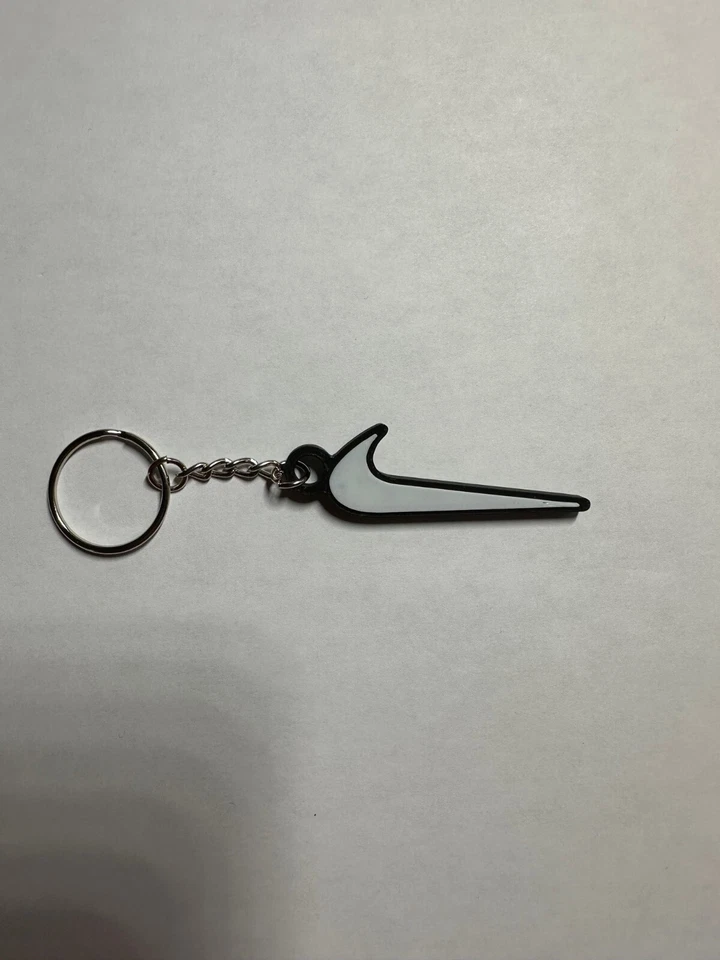 Nike Swoosh Logo Key chain, Shoe tag, Clothing Accessories - Image 1 of 4