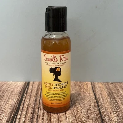 Condicionador para tratamento de cabelo Camille Rose Honey Hydrate Leave-in 2 Oz - Imagem 1 de 2