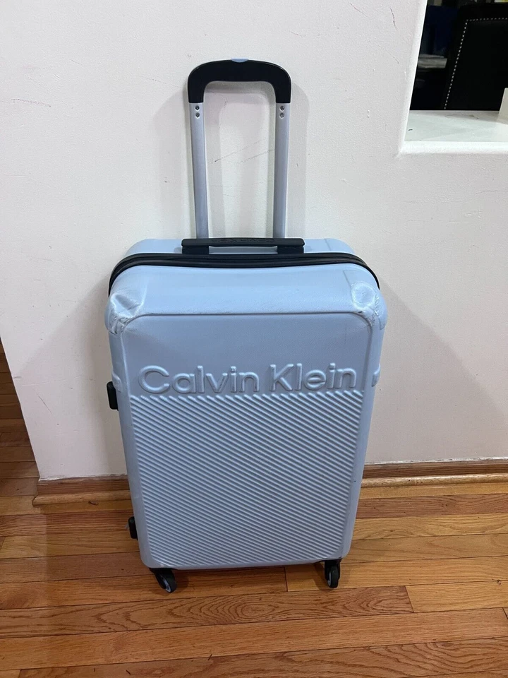 Maleta rígida CALVIN KLEIN azul 25" giratoria maleta ligera Foto 1 de 4