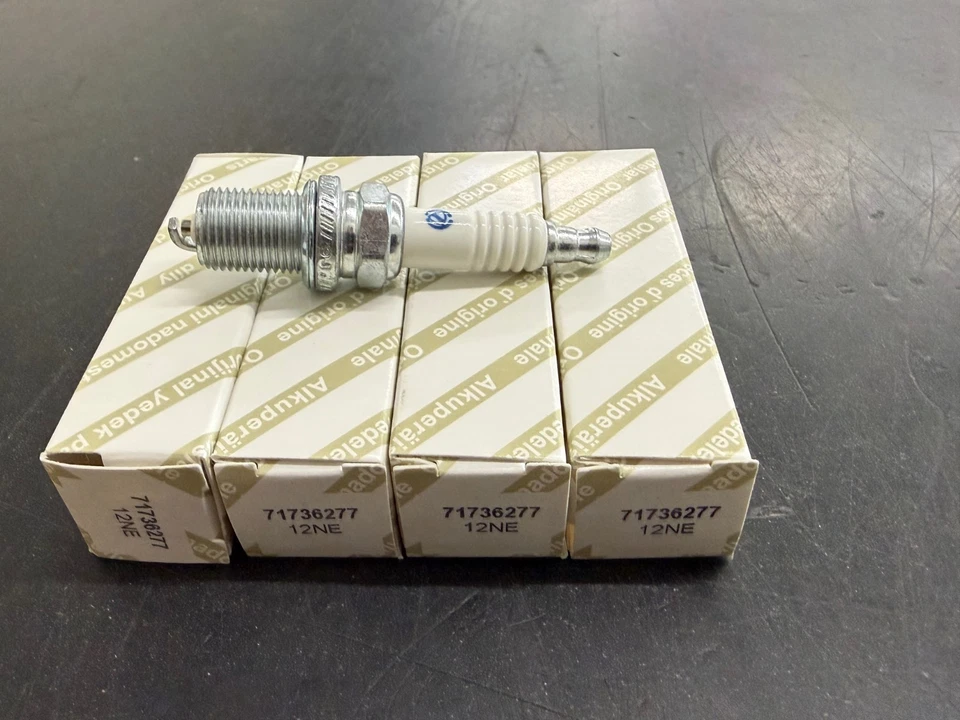 FIAT ALFA LANCIA CANDELE ACCENSIONE ORIGINALI E NUOVE 71736277 KIT 4 PEZZI - Immagine 1 di 1