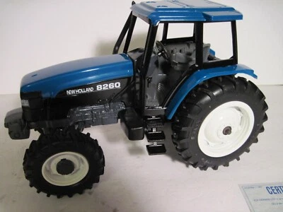 New Holland Farm Toy Tractor "8260" Ertl 1/16 - Image 1 of 4