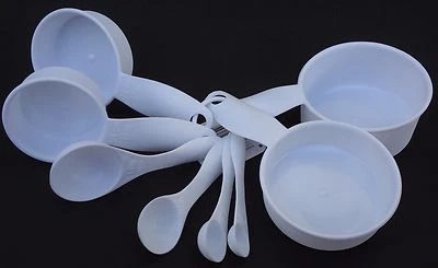 Kitchen Measuring Cups And Spoons Nesting 8 Piece Set White Plastic - Image 1 of 3