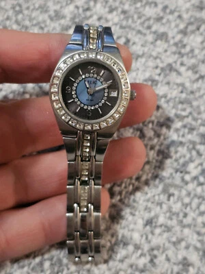 RELIC WOMENS DRESS WATCH W/GEMSTONES AROUND FACE ON SILVER BAND; ZR-11774 - Image 1 of 4