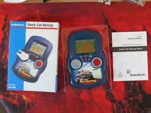 RadioShack Sonic Car Racing Handheld with Box & Manual CIB 60-2661 FOR PARTS - Picture 1 of 9