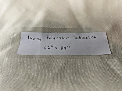 Ivory Polyester Tablecloth Elegant Home Dining 62" x 84" - Image 1 of 4