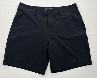 Oakley Hydrolix Hombres 34 x 7” Calce Regular Híbrido Pantalones Cortos Informales Ropa Activa Negros Foto 1 de 4