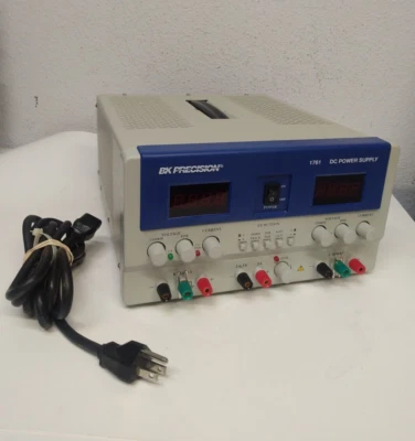 FUENTE DE ALIMENTACIÓN BK PRECISION 1761 TRIPLE SALIDA DC (0-35V/2-6.5V 0-3A/0-5A) PARA PIEZA Foto 1 de 4