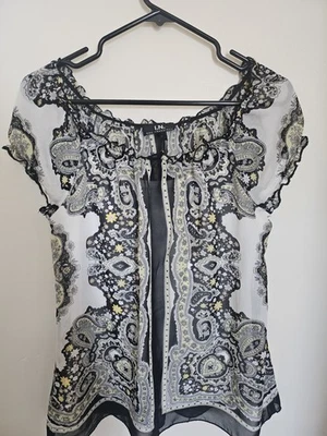 I. N. SAN FRANCISCO - TALLA SUPERIOR. LENTEJUELAS CON CUENTAS M  Foto 1 de 4