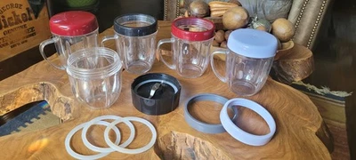 Magic Bullet MB1001 Accessories, 4 Mugs, Lids Additional Base/blade, Gaskets - Image 1 of 4