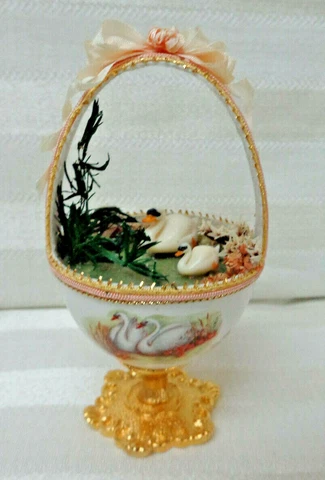 Egg Shaped Basket With Miniature Swan Figurines Cover