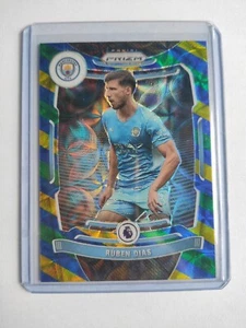 2021-22 PANINI PRIZM PREMIER LEAGUE Ruben Dias CHOICE BLUE/YELLOW/GREEN - Zdjęcie 1 z 2