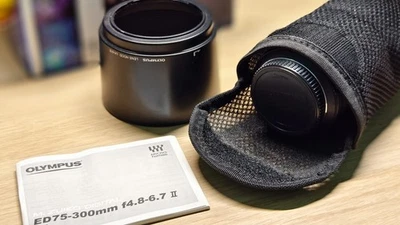 Olympus M.ZUIKO ED 75-300mm F4.8-6.7 II Lens – Excellent Condition, Original Box - Image 1 of 4