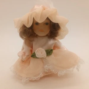 Miniature Porcelain Doll Pink Dress Brown Hair Blue Eyes 3 Inch - Picture 1 of 7