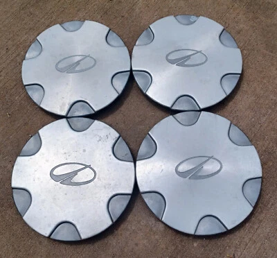 Oldsmobile Bravada Juego de 4 tapas centrales, 1998-2001 parte # 15715636 Foto 1 de 3