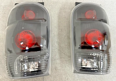 *VENTA DEVUELTA* ANZO (211084) para Ford Explorer 1998-2001 luces traseras negras. Foto 1 de 3