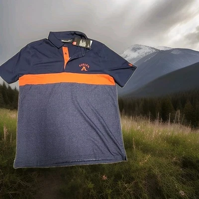 Camisa polo Under Armour azul con logotipo castaño rojizo grande para hombre Foto 1 de 4