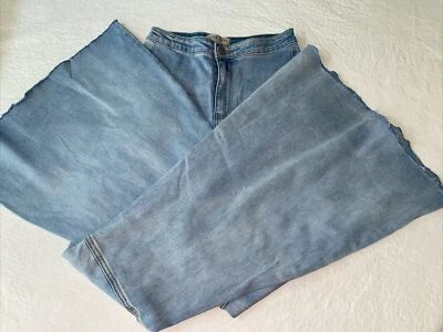 Jeans Ultra Acampanados Pierna Dobladillo Crudo Lavado Ligero M Foto 1 de 3