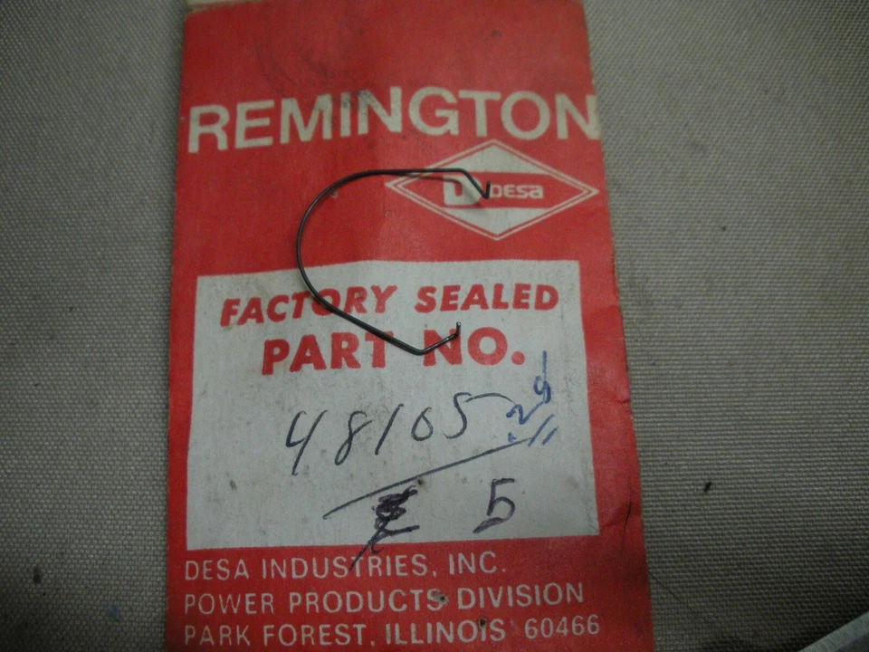 NOS OEM REMINGTON CHAINSAW SPRING 48105 R1 - Image 1 of 1