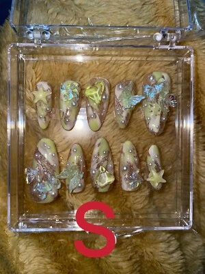 tips per unghie finte/verde/alcicocca/farfalla/cuore/perla/stella/papillon/moda - Immagine 1 di 3