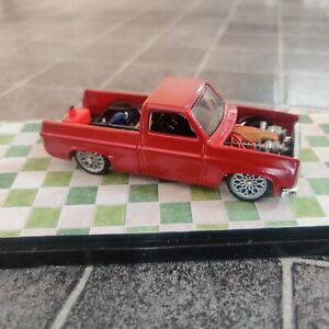 hot wheels Silverado Customized  Case And Decorative Items Included.