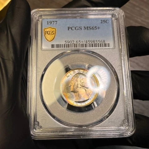 MS65+ 1977 25C Washington Quarter, PCGS Secure- Rainbow Album Toned Cover