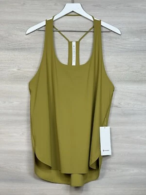 Camiseta sin mangas Lululemon Coastal talla 12 ajuste relajado hasta la cadera oro áurico AGLD 75228 Foto 1 de 4